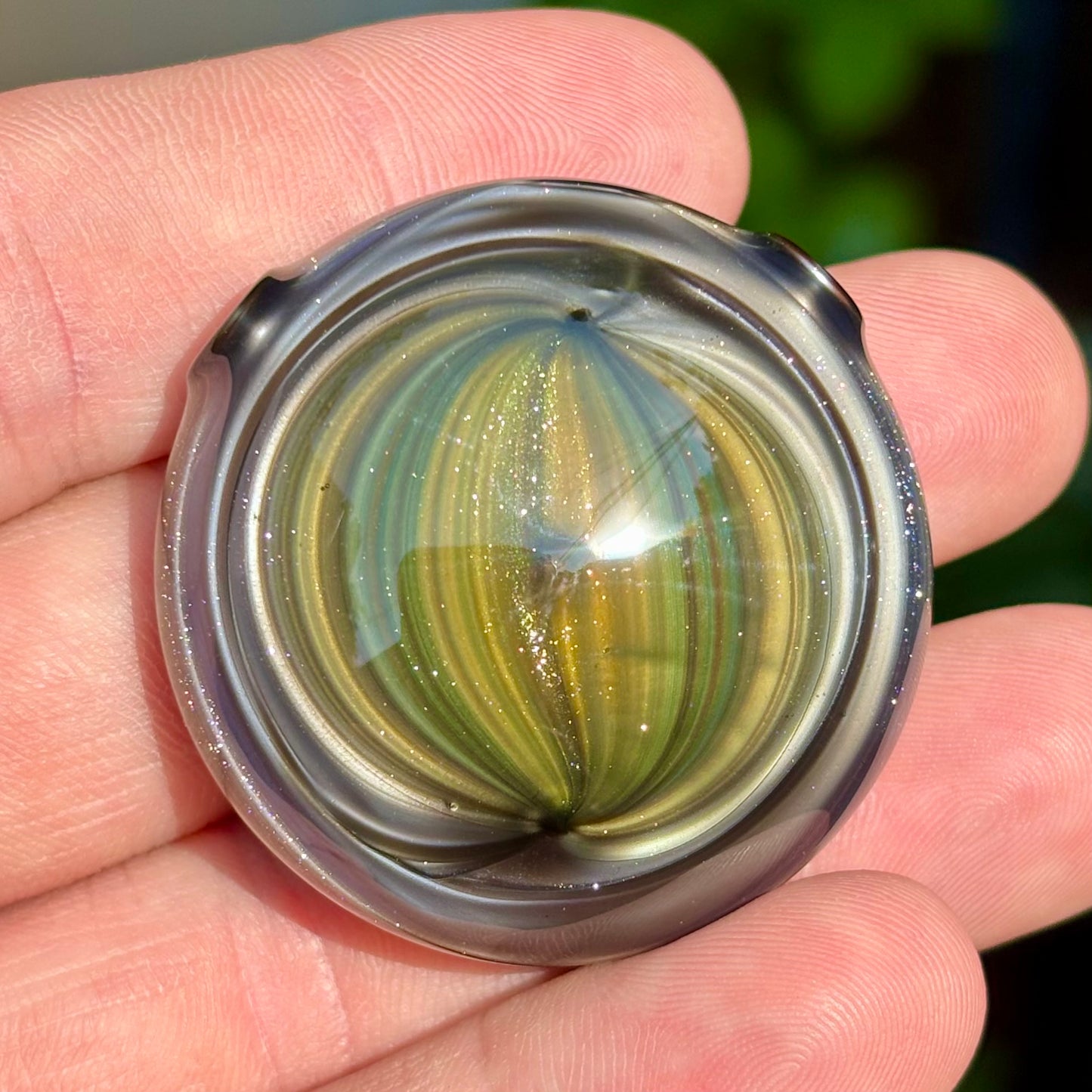 Green, purple and electrum pendant